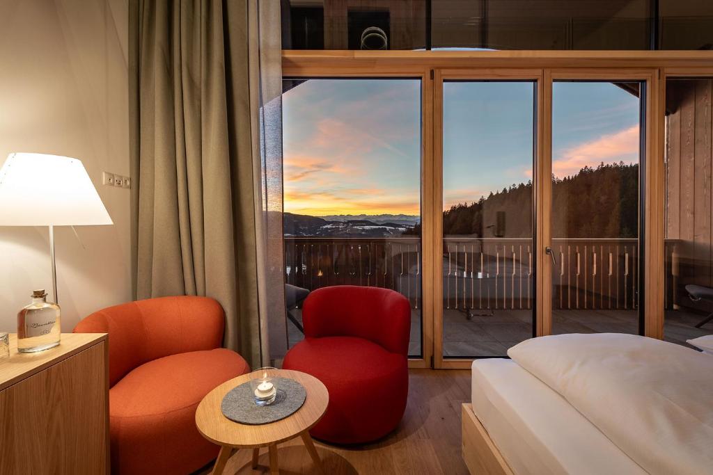 Postel nebo postele na pokoji v ubytování Hotel Bewaller