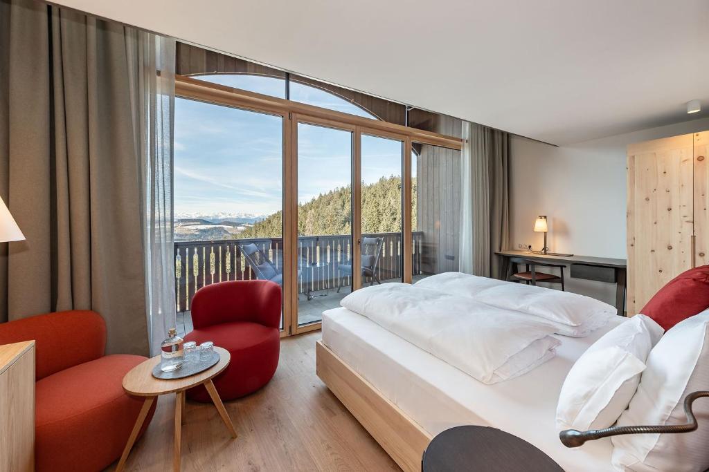 Postel nebo postele na pokoji v ubytování Hotel Bewaller