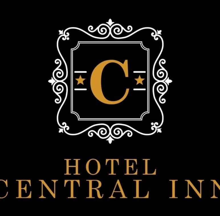 a hotel international inn logo with a c in a frame at HOTEL CENTRAL INN in San Juan