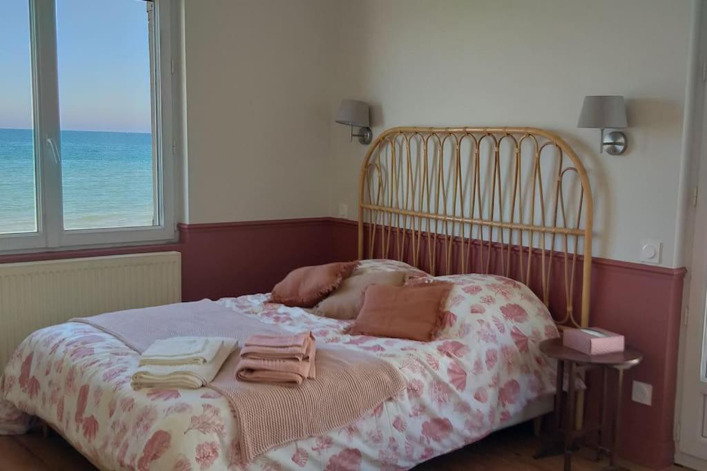 Postel nebo postele na pokoji v ubytování Vue exceptionnelle en front de mer, 8 personnes