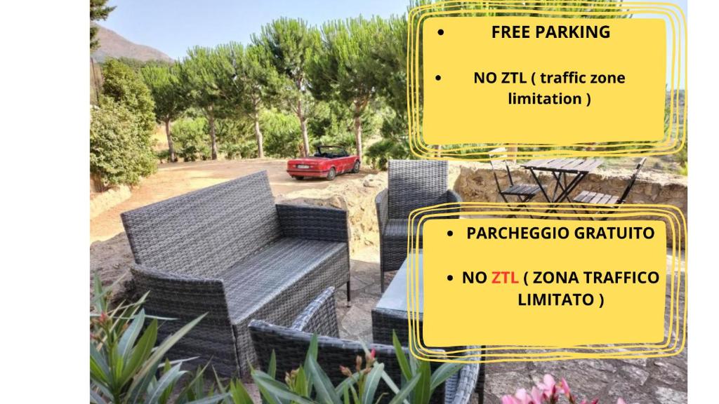 two signs that say no waikikiiki traffic zone limitation at Casale Ginisara in Castellammare del Golfo