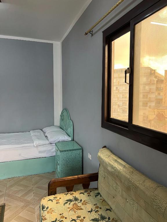 Postel nebo postele na pokoji v ubytování Aoda pyramids
