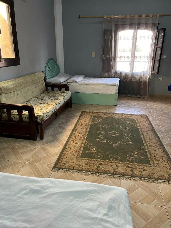 Postel nebo postele na pokoji v ubytování Aoda pyramids