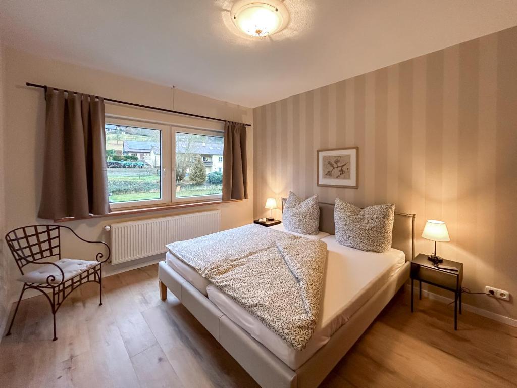 Postel nebo postele na pokoji v ubytování Haus Meerten