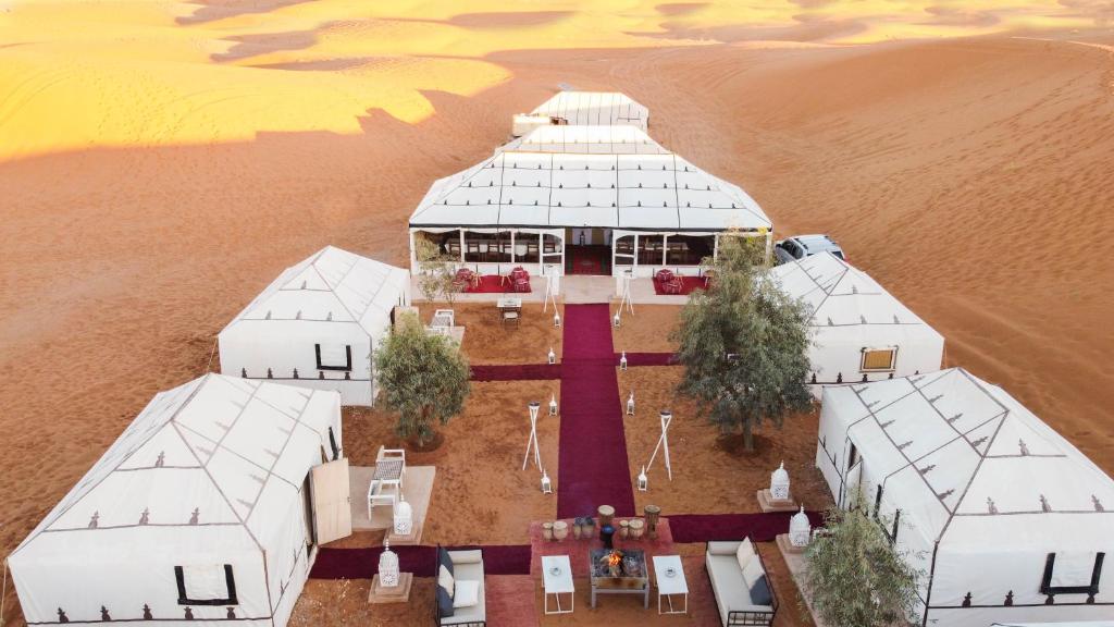 an aerial view of a building in the desert at Luxury Camp Chebbi in Merzouga