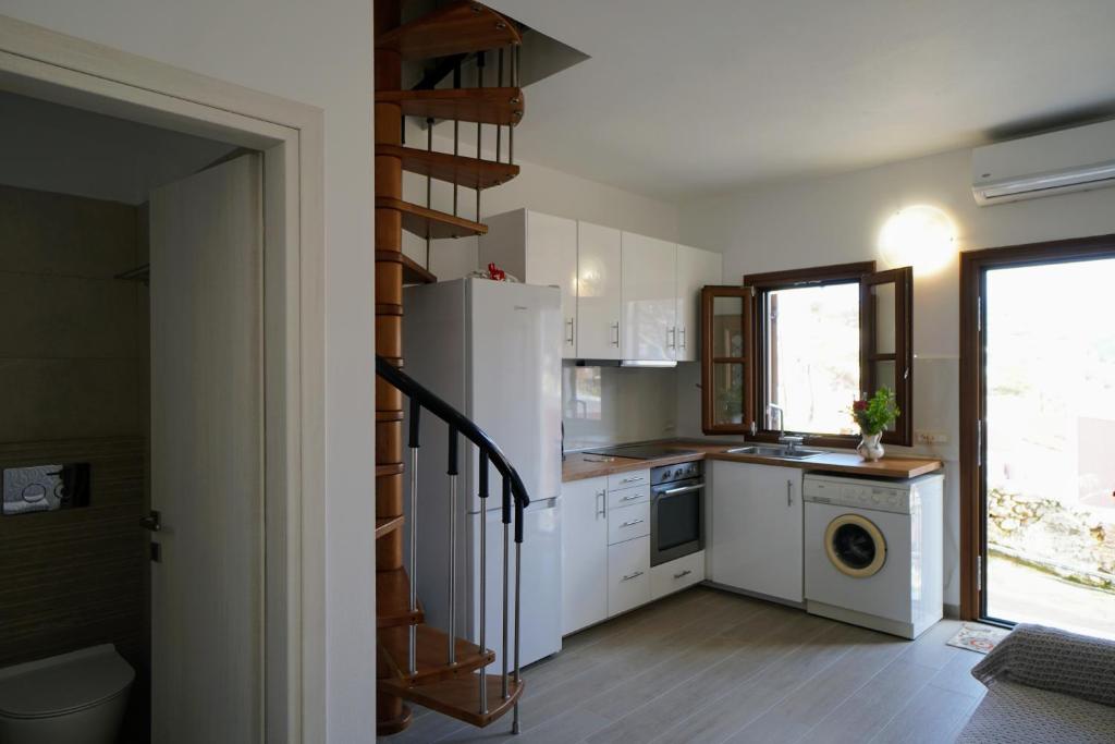 Kuchyň nebo kuchyňský kout v ubytování Oceanis apartment