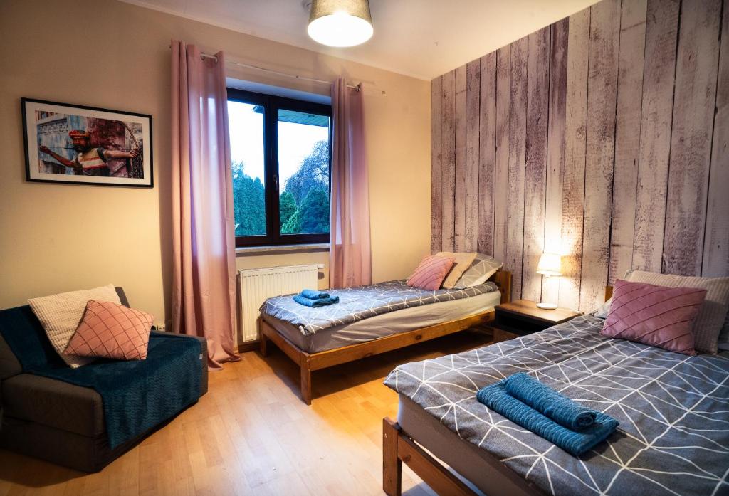 Posteľ alebo postele v izbe v ubytovaní Cze Chill House - Dom na Kaszubach