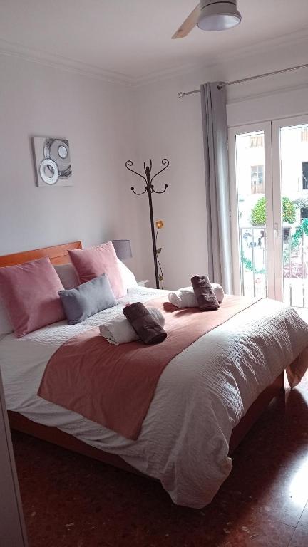 Postel nebo postele na pokoji v ubytování Casa Rural Plaza Zahara Buenas Vistas