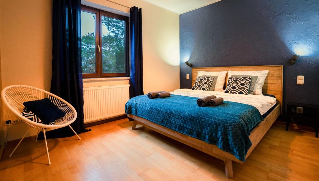 Posteľ alebo postele v izbe v ubytovaní Cze Chill House - Dom na Kaszubach