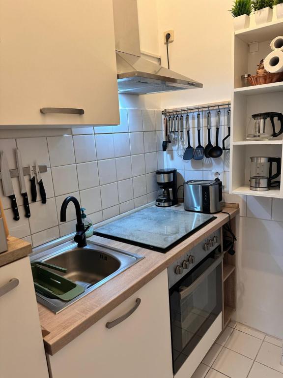 Kuchyň nebo kuchyňský kout v ubytování Hansestübchen