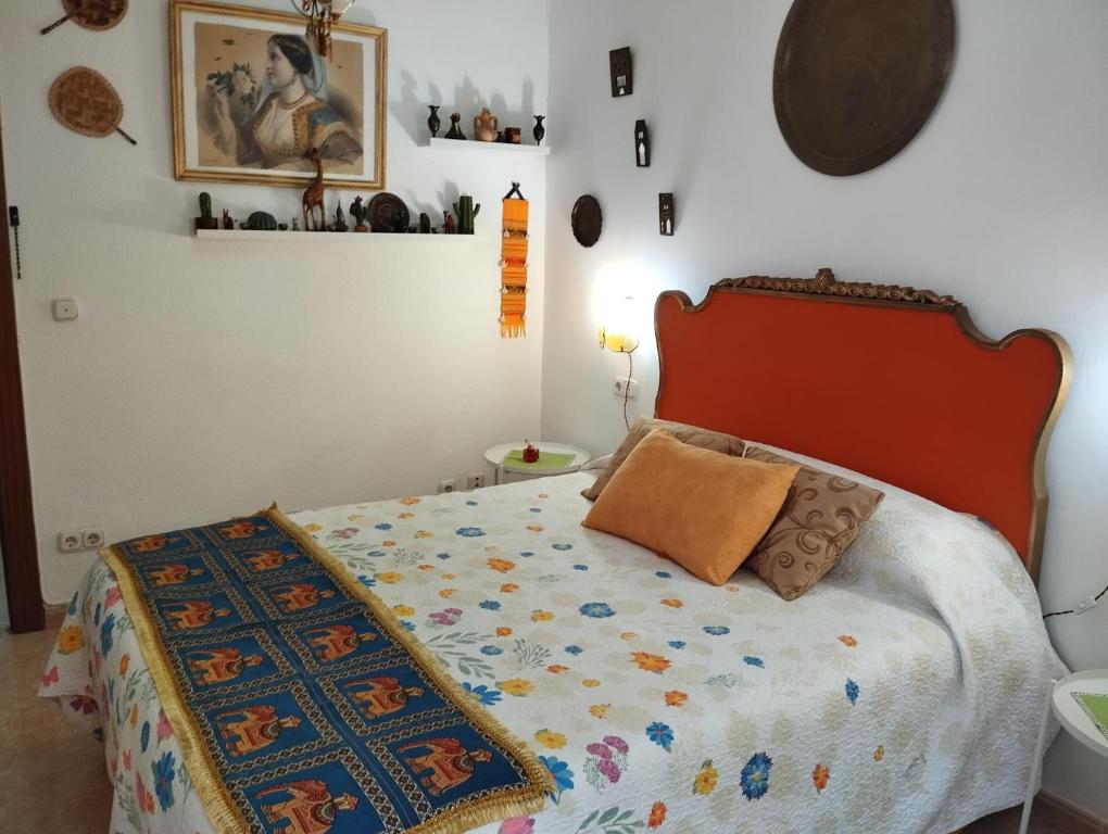 Postel nebo postele na pokoji v ubytování La Casa de La Abuela Rosy