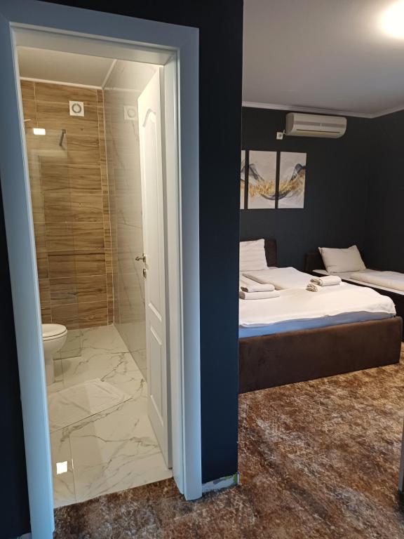 Postel nebo postele na pokoji v ubytování Villa Anri