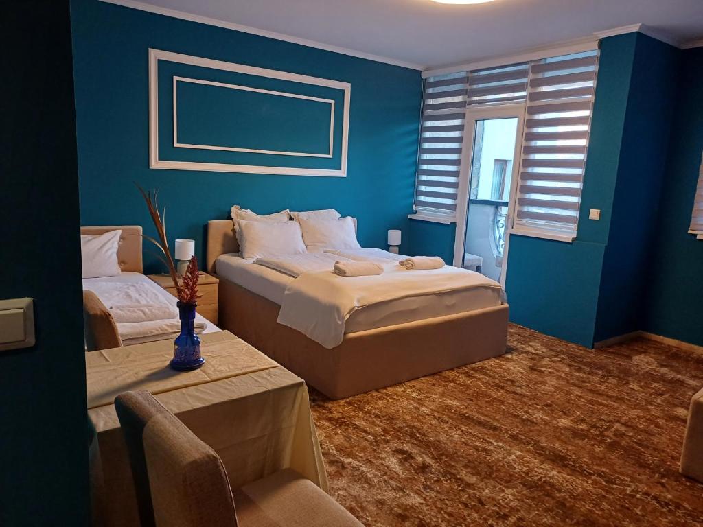 Postel nebo postele na pokoji v ubytování Villa Anri