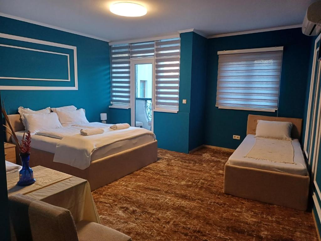 Postel nebo postele na pokoji v ubytování Villa Anri