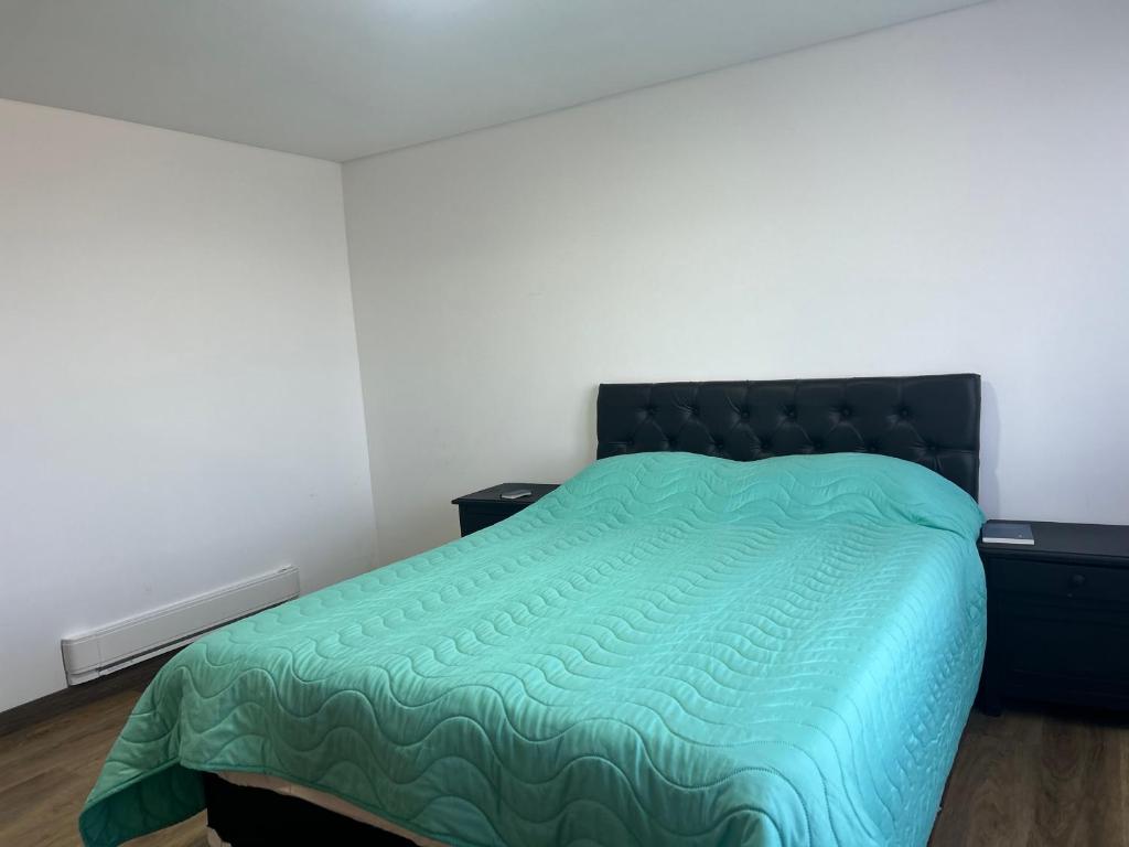 Voodi või voodid majutusasutuse Chalet Íntimo-Delpilar con zona de Jacuzzi ! toas