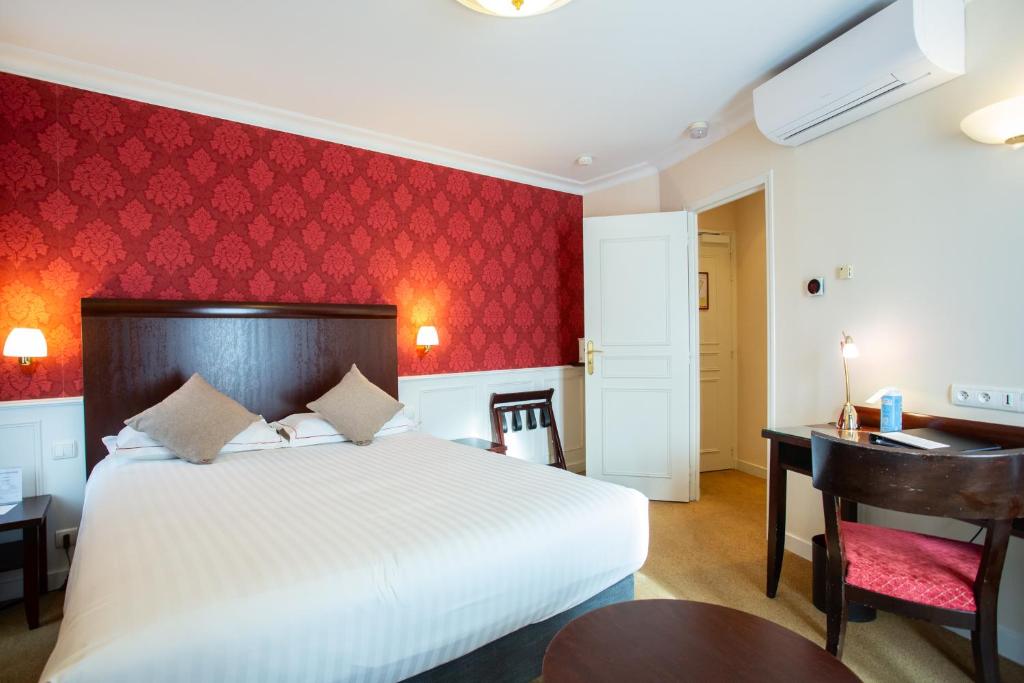 Postel nebo postele na pokoji v ubytování Best Western Plus Hôtel D'Angleterre