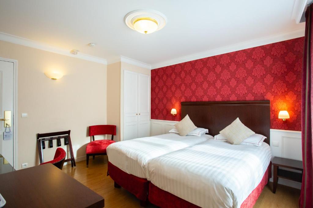 Postel nebo postele na pokoji v ubytování Best Western Plus Hôtel D'Angleterre