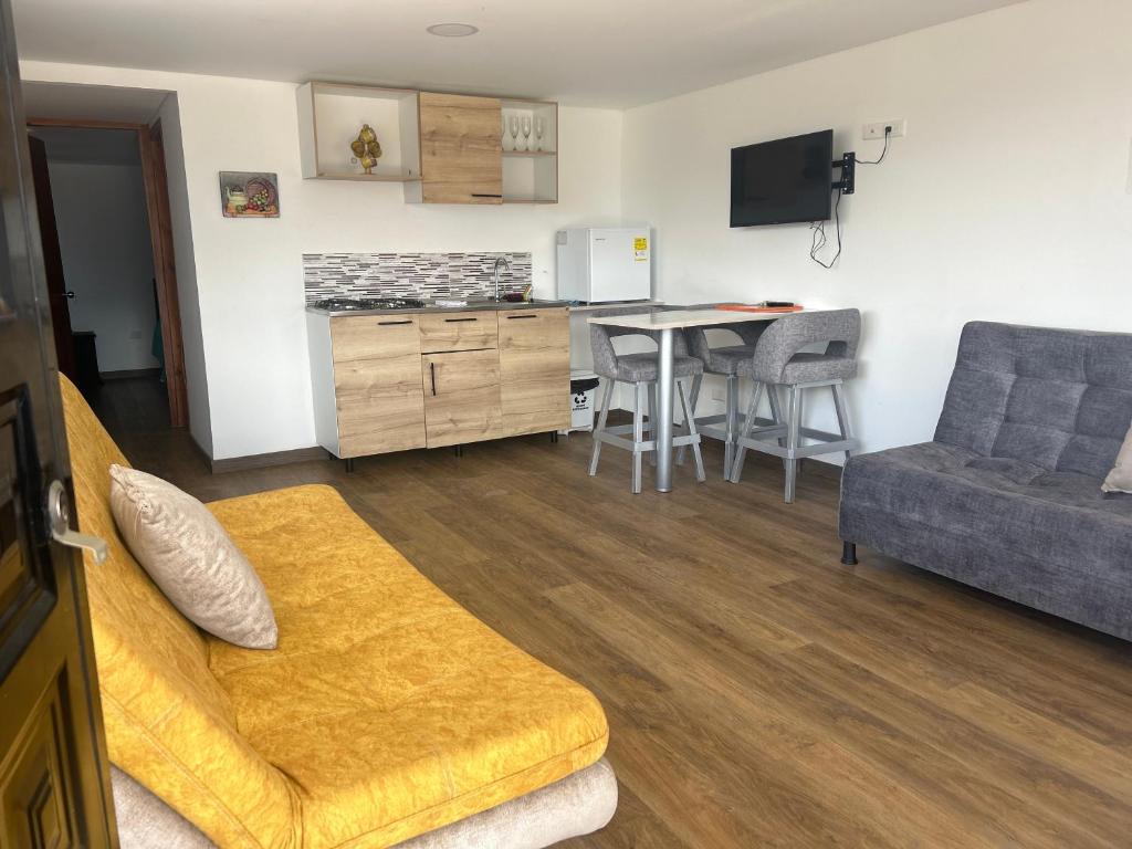 Köök või kööginurk majutusasutuses Chalet Íntimo-Delpilar con zona de Jacuzzi !