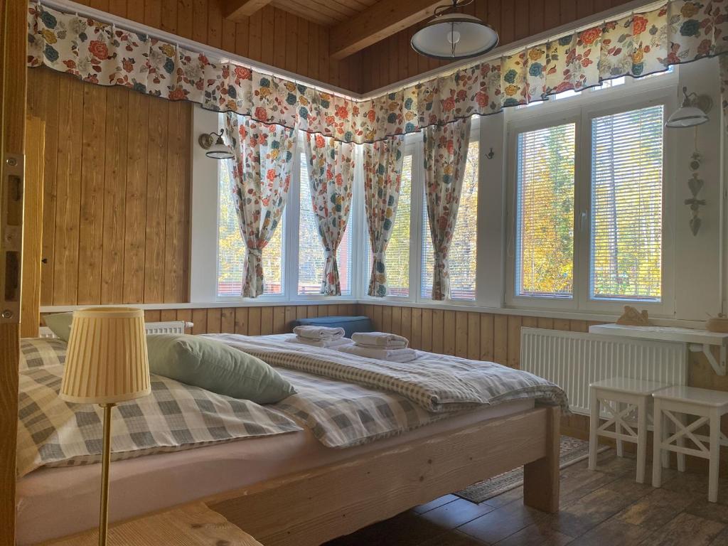 Postel nebo postele na pokoji v ubytování Apartmany Moravienka