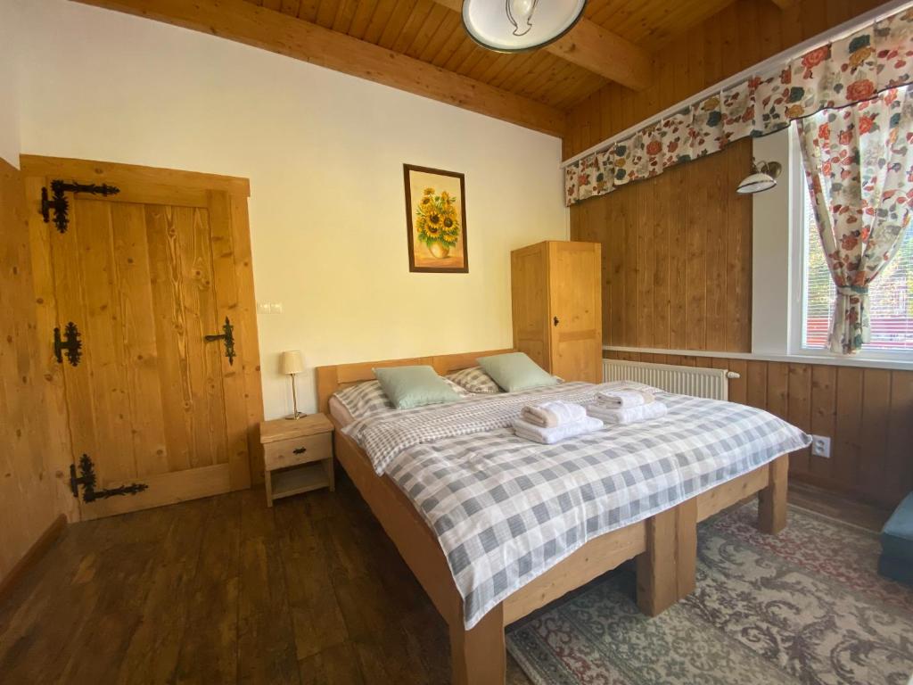 Postel nebo postele na pokoji v ubytování Apartmany Moravienka