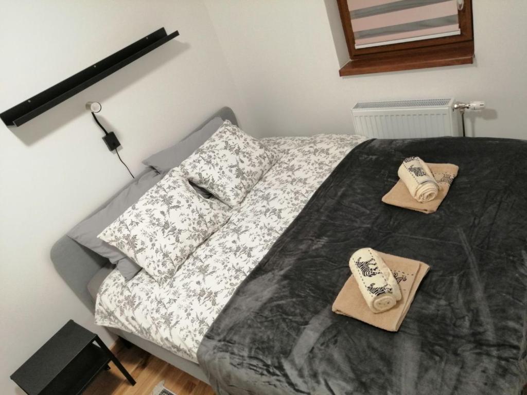 Postel nebo postele na pokoji v ubytování Divčinova S1
