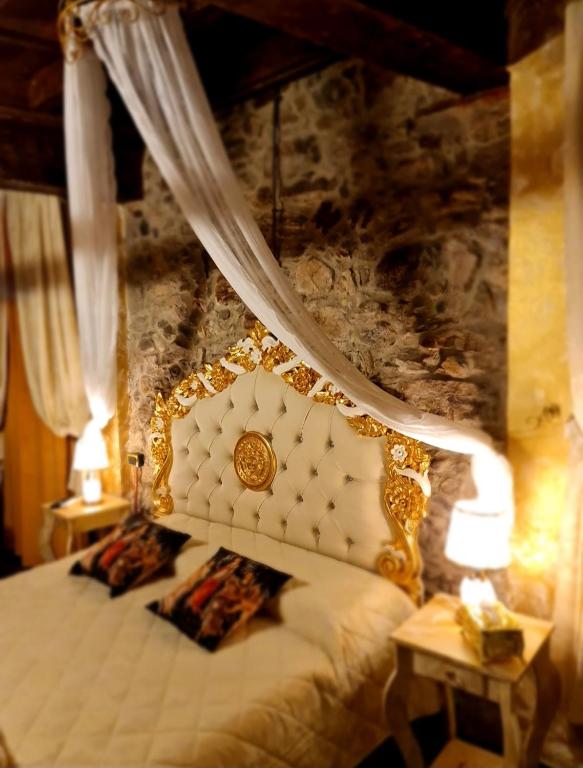 Postel nebo postele na pokoji v ubytování SUITE BOTTICELLI