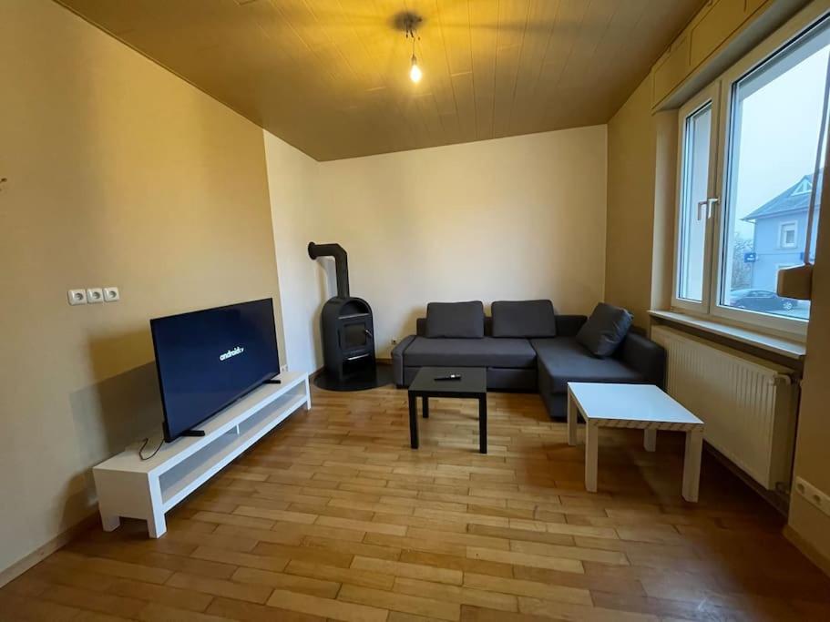 Uma área de estar em Spacious 5-Bedroom Accommodation in Luxembourg