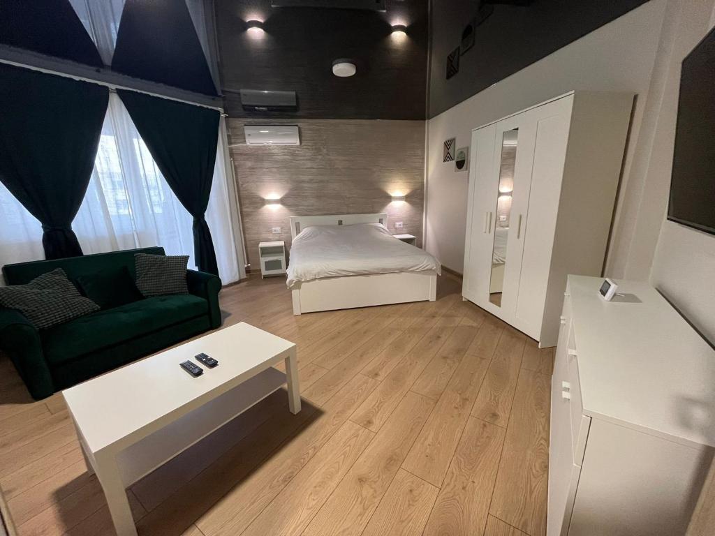 Ένα ή περισσότερα κρεβάτια σε δωμάτιο στο Mazepa Apartment