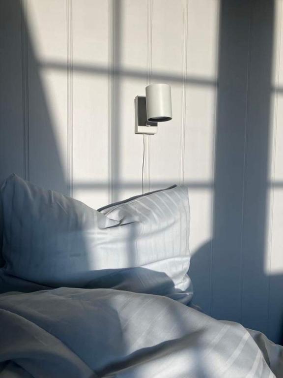 Postel nebo postele na pokoji v ubytování GuestHouse Læsø