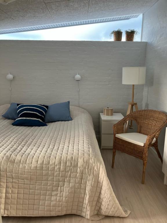 Postel nebo postele na pokoji v ubytování GuestHouse Læsø