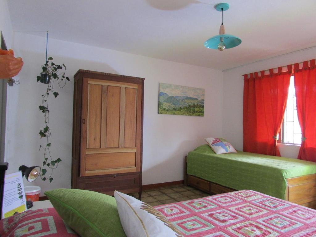 Postel nebo postele na pokoji v ubytování Alojamiento Rural Jardín Consentido