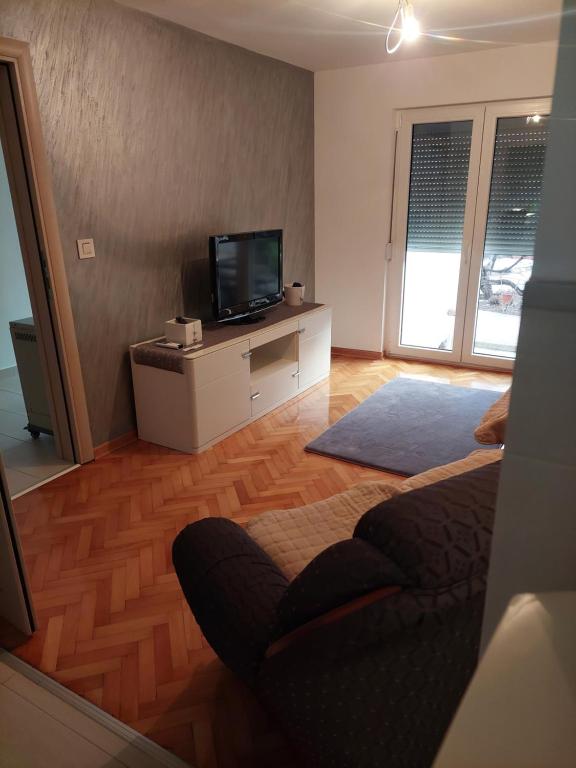 TV a/nebo společenská místnost v ubytování Z A M A K