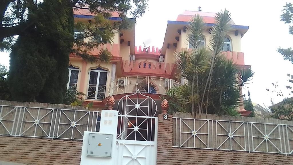 a large house with a gate in front of it at ESTRELLA LOUNGE in Benalmádena