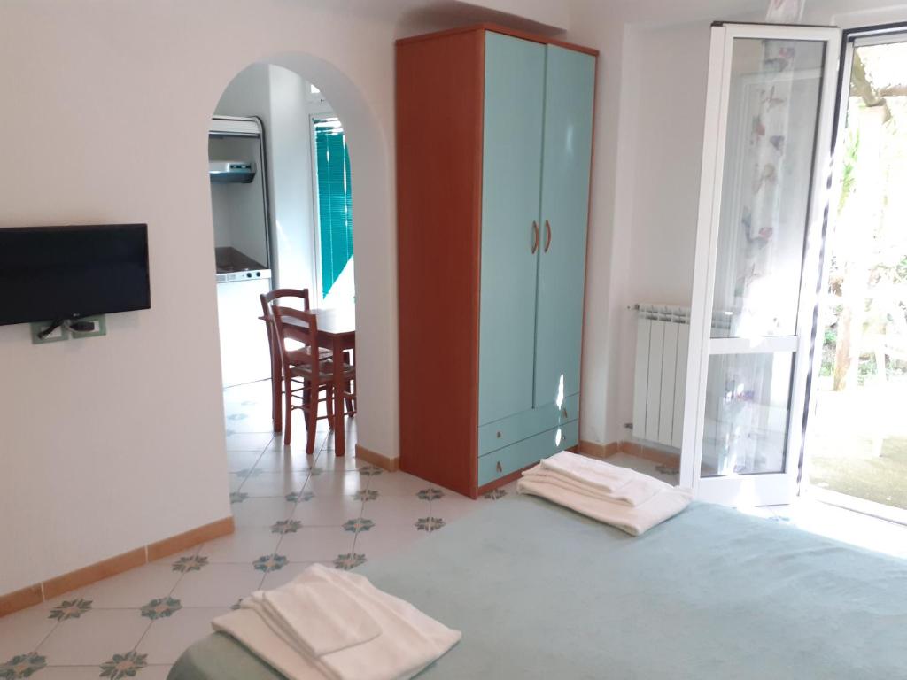 TV a/nebo společenská místnost v ubytování Paco Residence Benessere & Relax