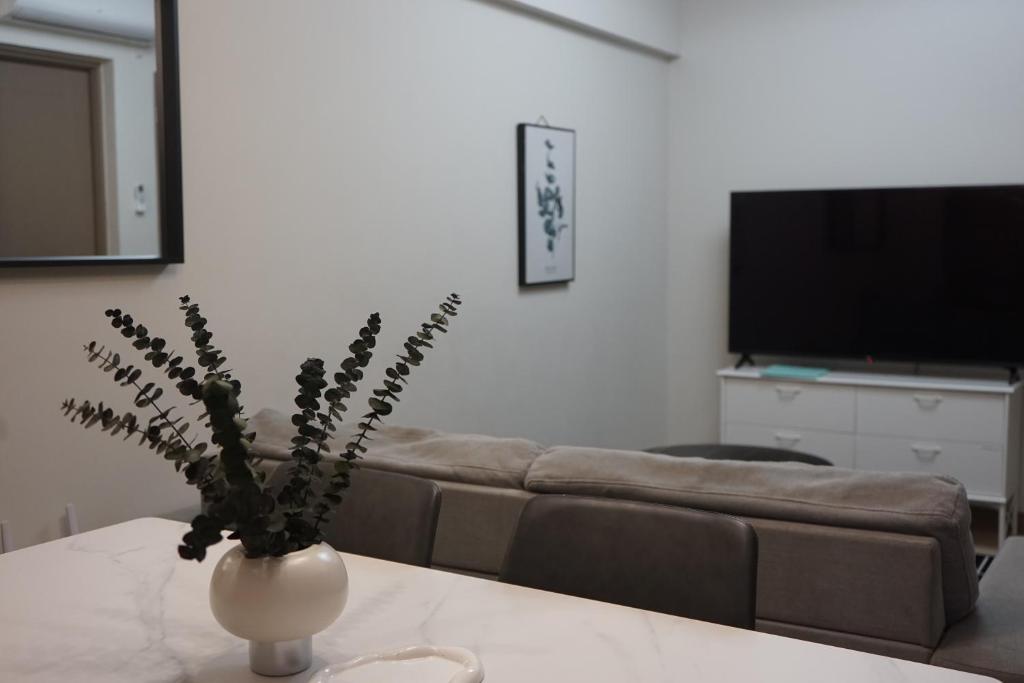 Een TV en/of entertainmentcenter bij Alea Residences
