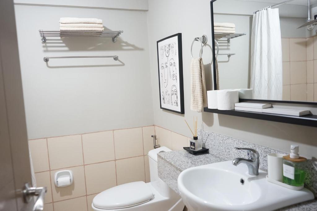 Een badkamer bij Alea Residences