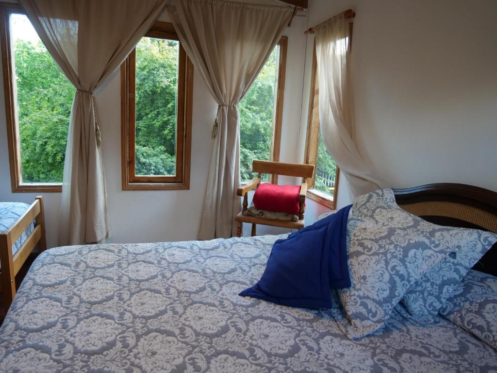 Postel nebo postele na pokoji v ubytování Cabañas Kalfucura