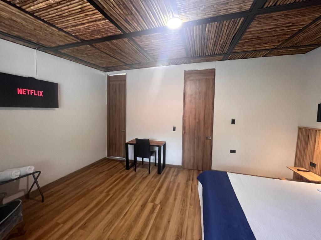Postel nebo postele na pokoji v ubytování Casa 121, calle 121 no 7-18