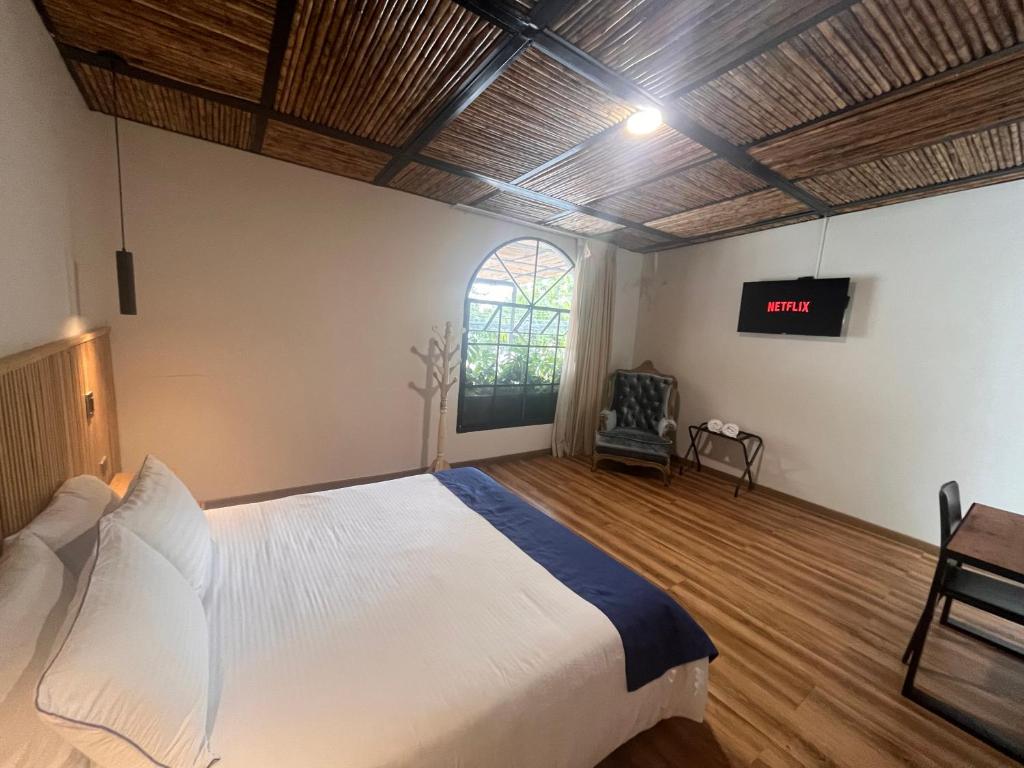 Postel nebo postele na pokoji v ubytování Casa 121, calle 121 no 7-18
