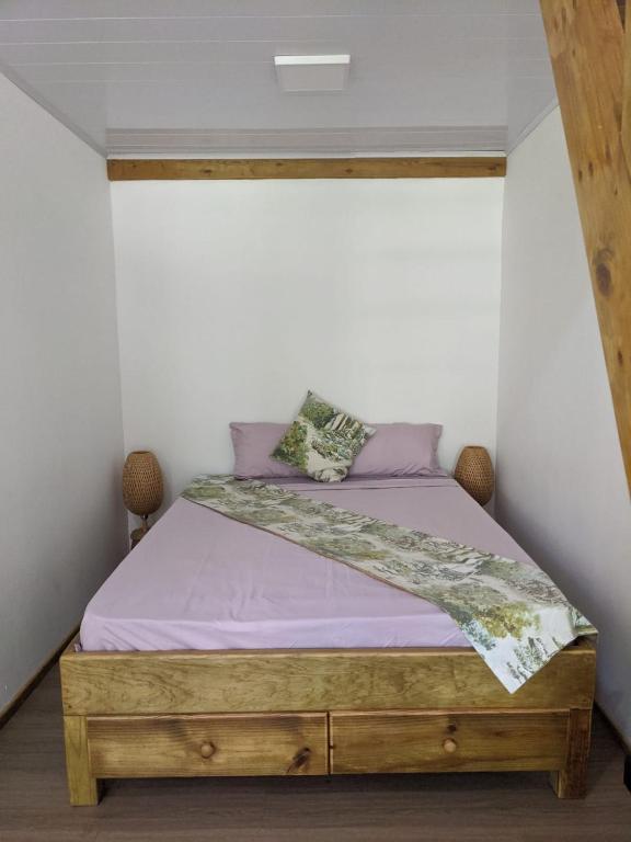 Postel nebo postele na pokoji v ubytování Playa Bluff Lodge