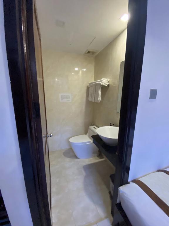 Koupelna v ubytování Kingdom Danang Hotel