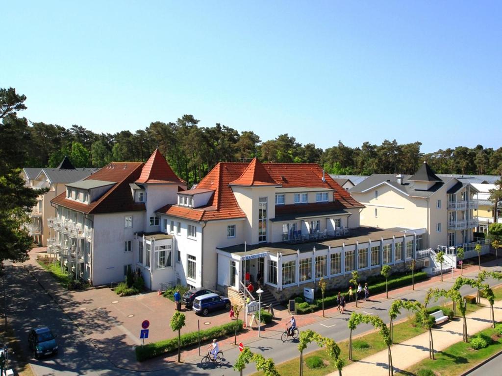 an overhead view of a large building in a town at R&R Strandhotel Baabe in Baabe