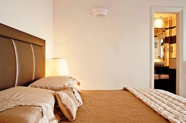 Postel nebo postele na pokoji v ubytování Asteras Villas