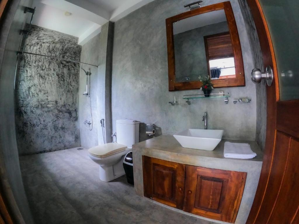 Koupelna v ubytování Hotel Athgira