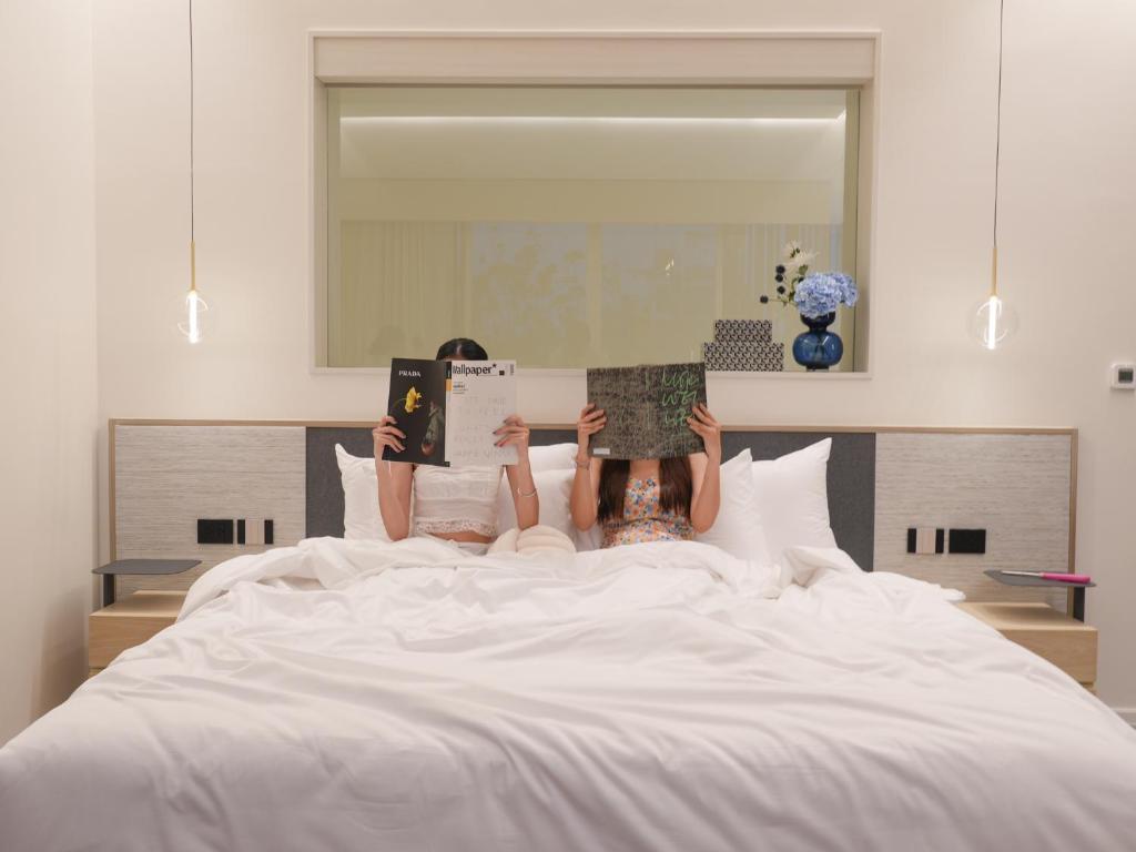 Postel nebo postele na pokoji v ubytování Veranda Pool Villas & Suite