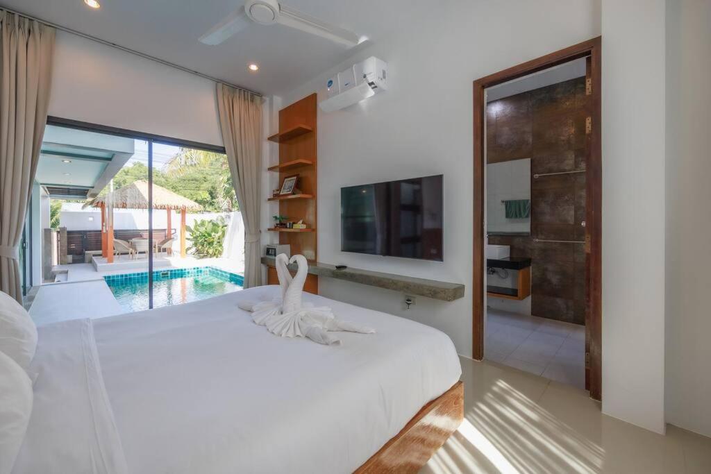 Voodi või voodid majutusasutuse Paradise Found: 2-Bedroom Villa Bliss in Rawai toas