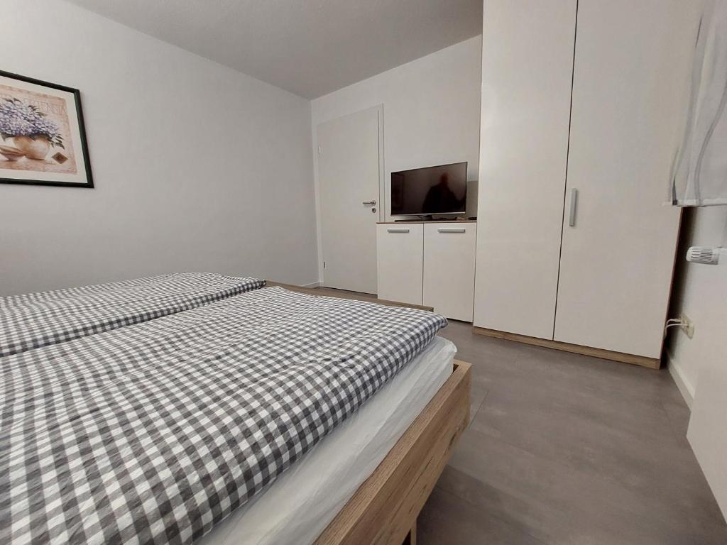Postel nebo postele na pokoji v ubytování Ferienwohnung Talgrund "Im Grünen"