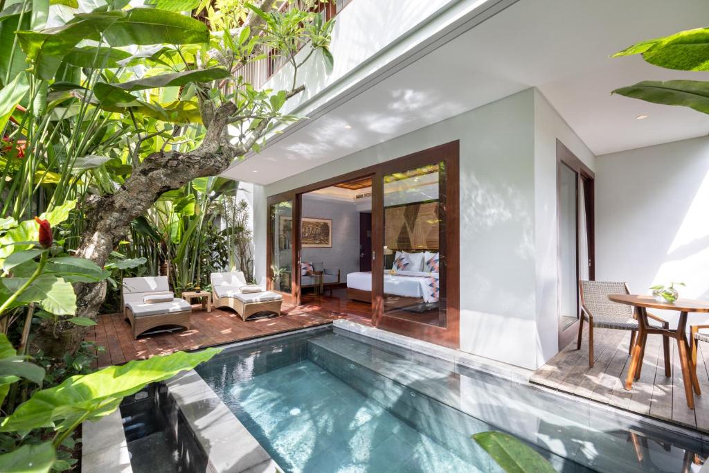Bazén v ubytování The Hava Ubud A Pramana Experience nebo v jeho okolí