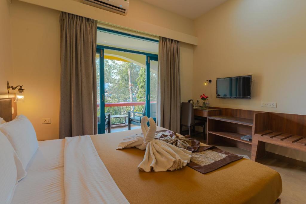 Postel nebo postele na pokoji v ubytování Carina Beach Resort