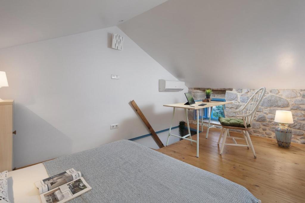 Łóżko lub łóżka w pokoju w obiekcie Apartment Stone House Krk